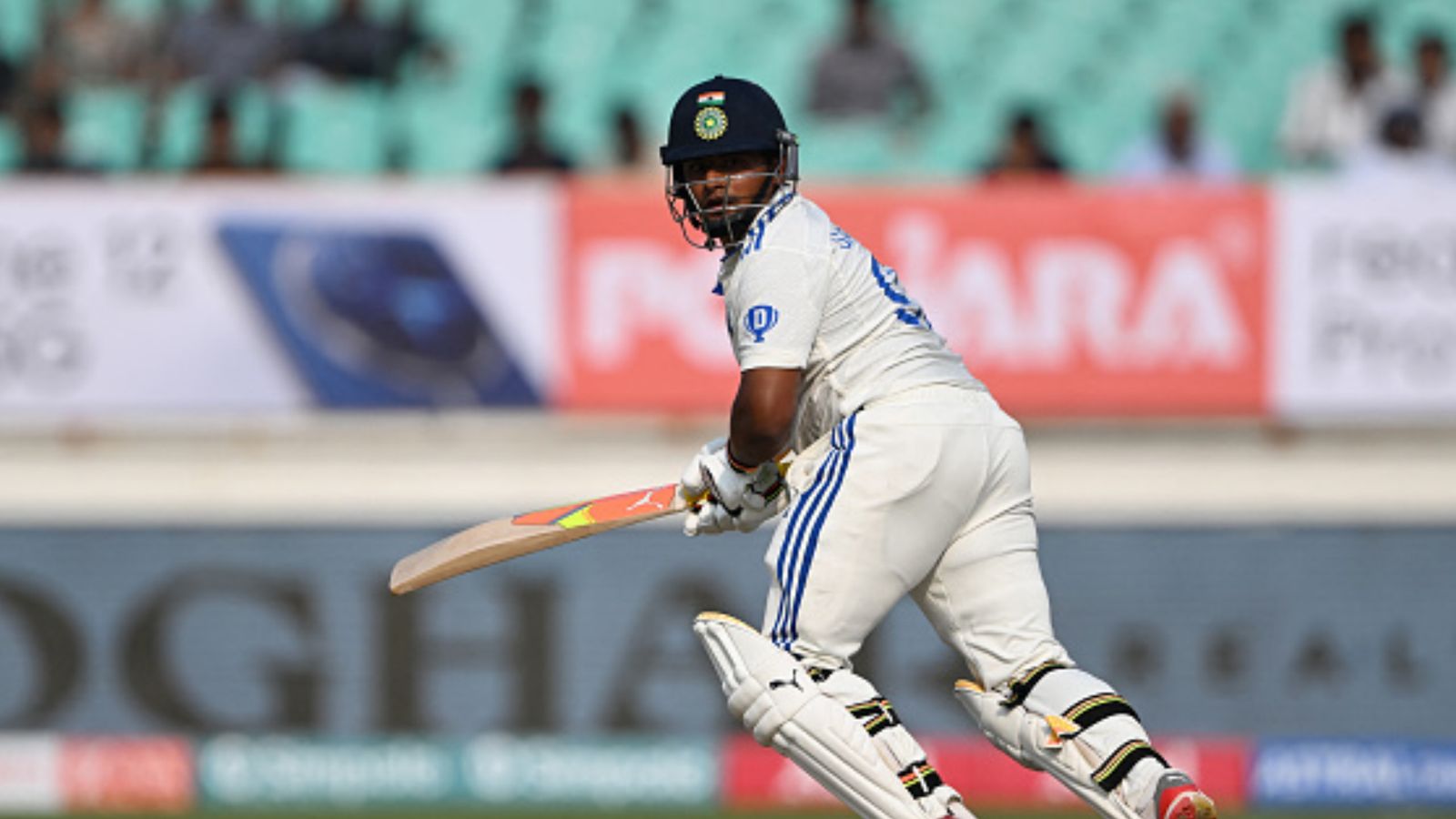 IND vs ENG: Sarfaraz Khan cracks fiery fifty to mark his dream debut for India in 3rd Test to give 'Bazball' taste to England in Rajkot India's Sarfaraz Khan plays a shot during the first day of the third Test cricket match between India and England at Niranjan Shah stadium in Rajkot on February 15, 2024. (Getty)