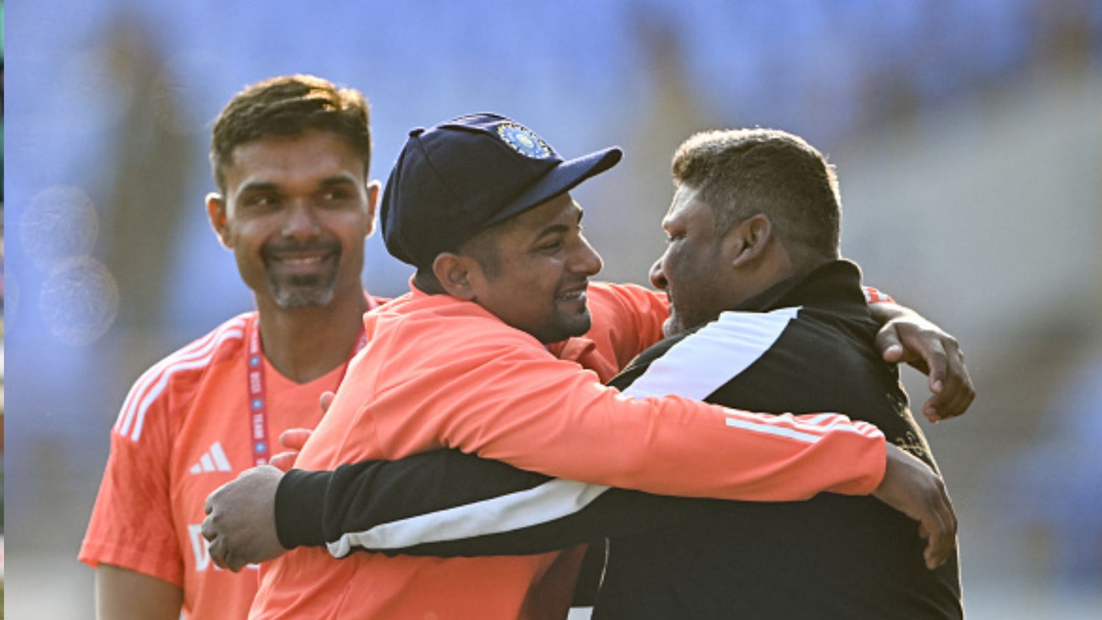 'All I wanted was to play international cricket in front of him': Sarfaraz Khan talks about father's sacrifices after dream debut in 3rd Test vs ENG India's Sarfaraz Khan (C) greets his father before his debut match in Rajkot on February 15. (Getty)