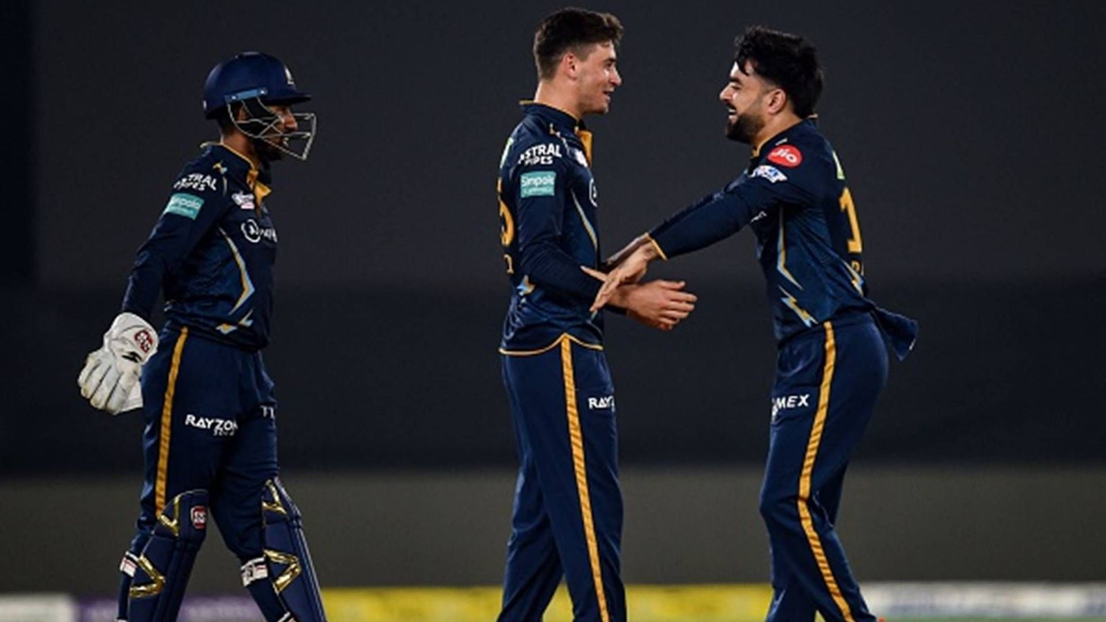 Big News: Gujarat Titans' Afghan spinner faces one-year ban for breach of contract Noor Ahmad celebrates a wicket with Rashid Khan (File Photo: Getty Images)