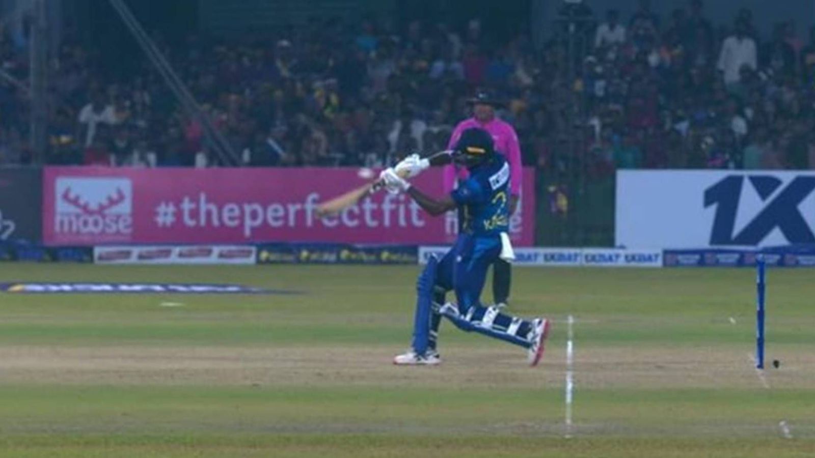 SL vs AFG: Afghan pacer bowls a beamer but umpire refuses to give no-ball in last over as Sri Lanka lose thrilling encounter by 3 runs Square leg umpire watches as Kamindu Mendis faces an above waist height ball in the final over (Screengrab: X)