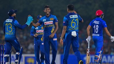 CSK's star shatters Lasith Malinga's five-year old record despite Sri Lanka's dramatic defeat vs Afghanistan in 3rd T20I Sri Lanka's Matheesha Pathirana (C) celebrates with teammates after taking the wicket of unseen Afghanistan batter Karim Janat during the 1st T20I on February 17. (Getty)