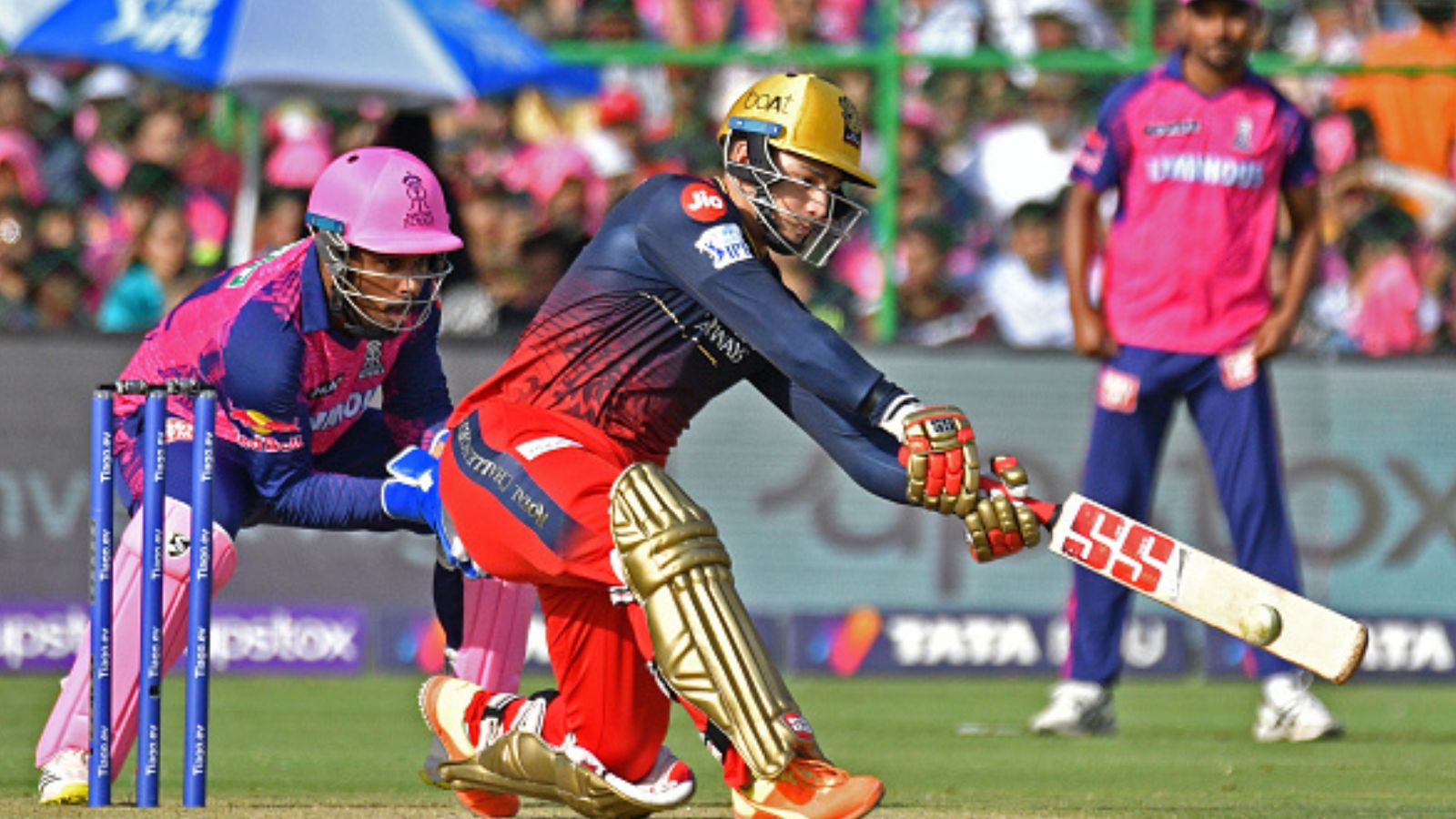 RCB's Rs 3.40 crore signee wreaks havoc with blistering century ahead of IPL 2024, tonks 14 fours, four sixes in 116-run knock RCB's Anuj Rawat (right) and Rajasthan Royals' Sanju Samson in this frame. (Getty)