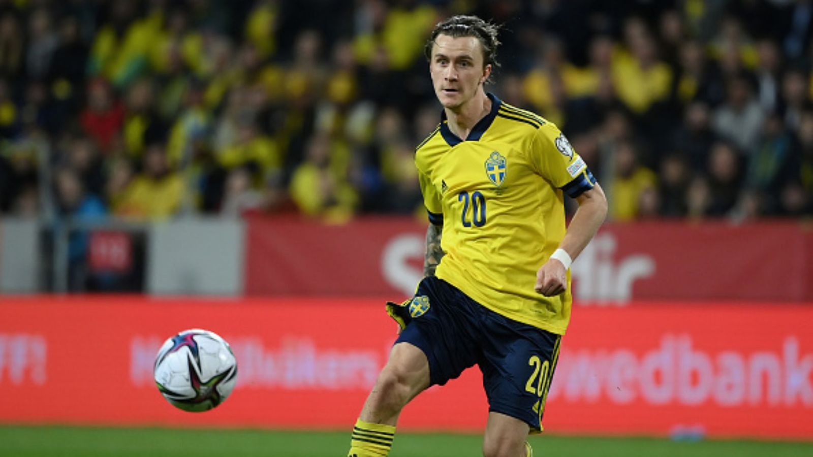 Sweden midfielder Kristoffer Olsson rushed to hospital after fainting at home due to acute brain condition Kristoffer Olsson of Sweden runs with the ball during the 2022 FIFA World Cup Qualifier knockout round play-off match. (File Photo: Getty Images)