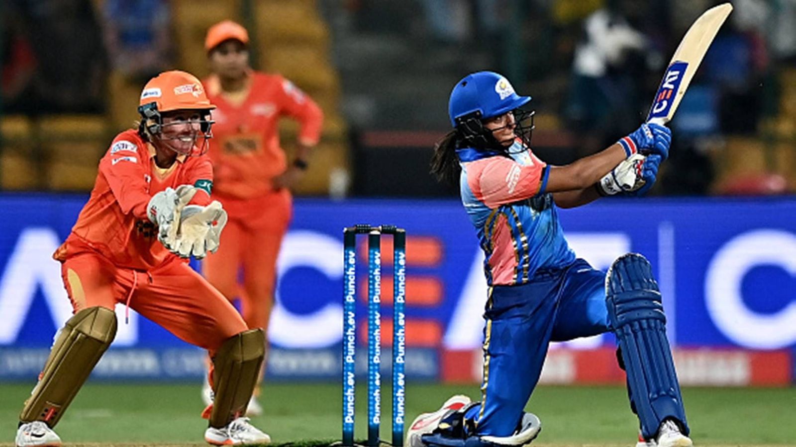 Why Mumbai Indians captain Harmanpreet Kaur is not playing against UP Warriorz? Harmanpreet Kaur plays a shot against Gujarat Giants (Getty Images)
