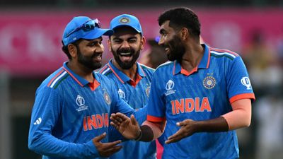 Revealed: How many warm-up matches will Team India play before T20 World Cup 2024? India's Jasprit Bumrah (R) celebrates with teammate Virat Kohli (C) and captain Rohit Sharma in this frame. (Getty)