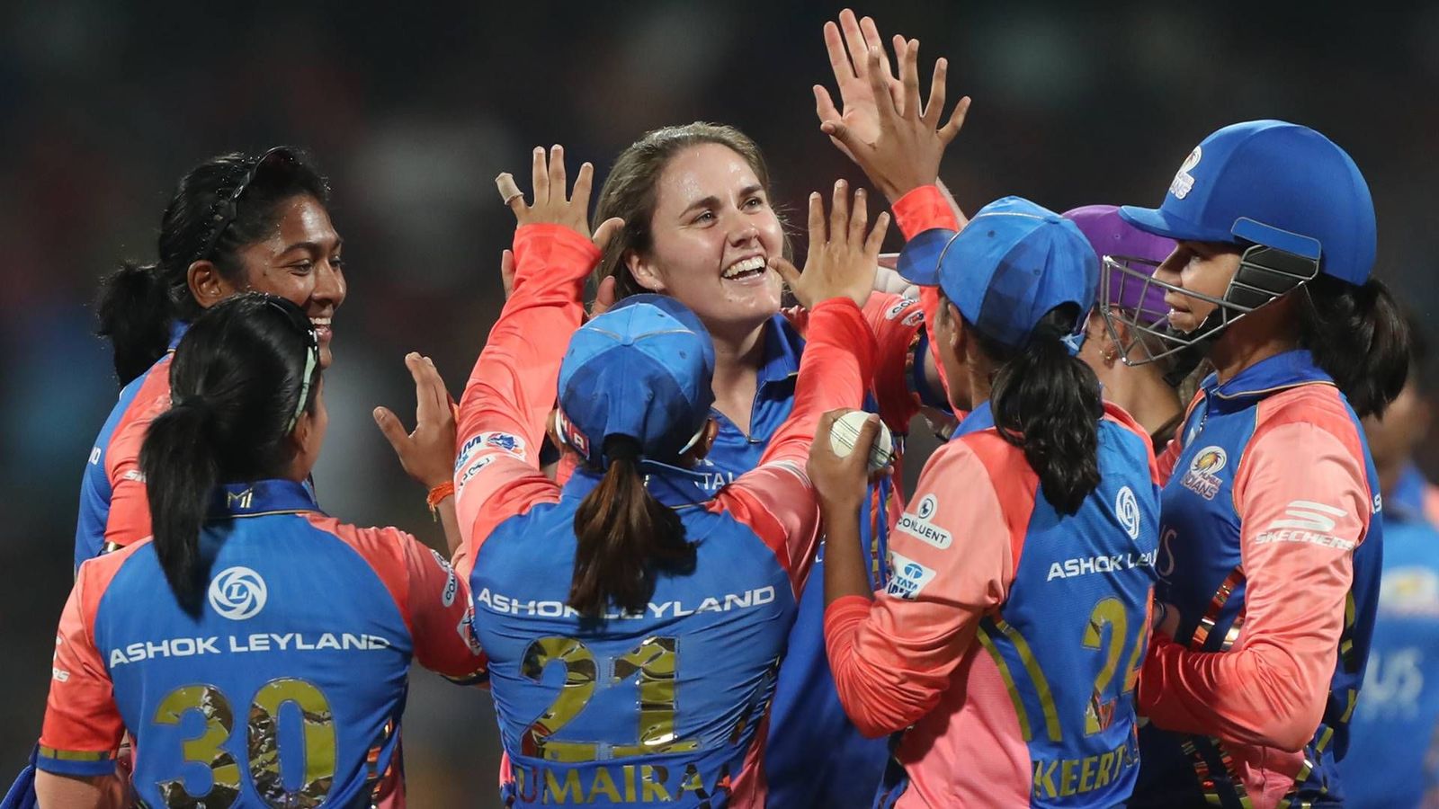 WPL 2024: In Harmanpreet's absence, Mumbai Indians continue dominance over RCB with 7-wicket win to regain top spot on points table Mumbai Indians players celebrate a wicket against RCB (Photo Courtesy: WPL, X)