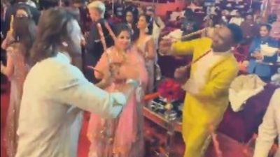 WATCH: MS Dhoni and Dwayne Bravo light up Anant Ambani-Radhika Merchant's pre-wedding celebration with special Dandiya Dance MS Dhoni and Dwaye Bravo were seen playing Dandiya during Anant Ambani-Radhika Merchant's pre-wedding celebration. (Screengrab-X)