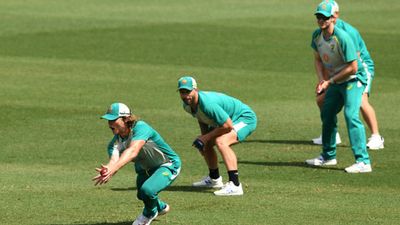 Australia star badly injured after taking lethal blow on head following nasty bouncer, suffers concussion before being subbed out of match Australia's Will Pucovski catches the ball and being watched by Matthew Wade and Steve Smith during an Australian nets session at the Sydney Cricket Ground on January 05, 2021 in Sydney. (Getty)