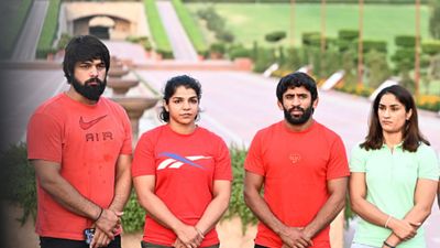 Delhi HC seeks government, WFI's response to wrestlers' petition against wrestling federation elections (L-R) Sakshi Malik’s husband Satyawart Kadian, Sakshi Malik, Bajrang Punia and Vinesh Phogat