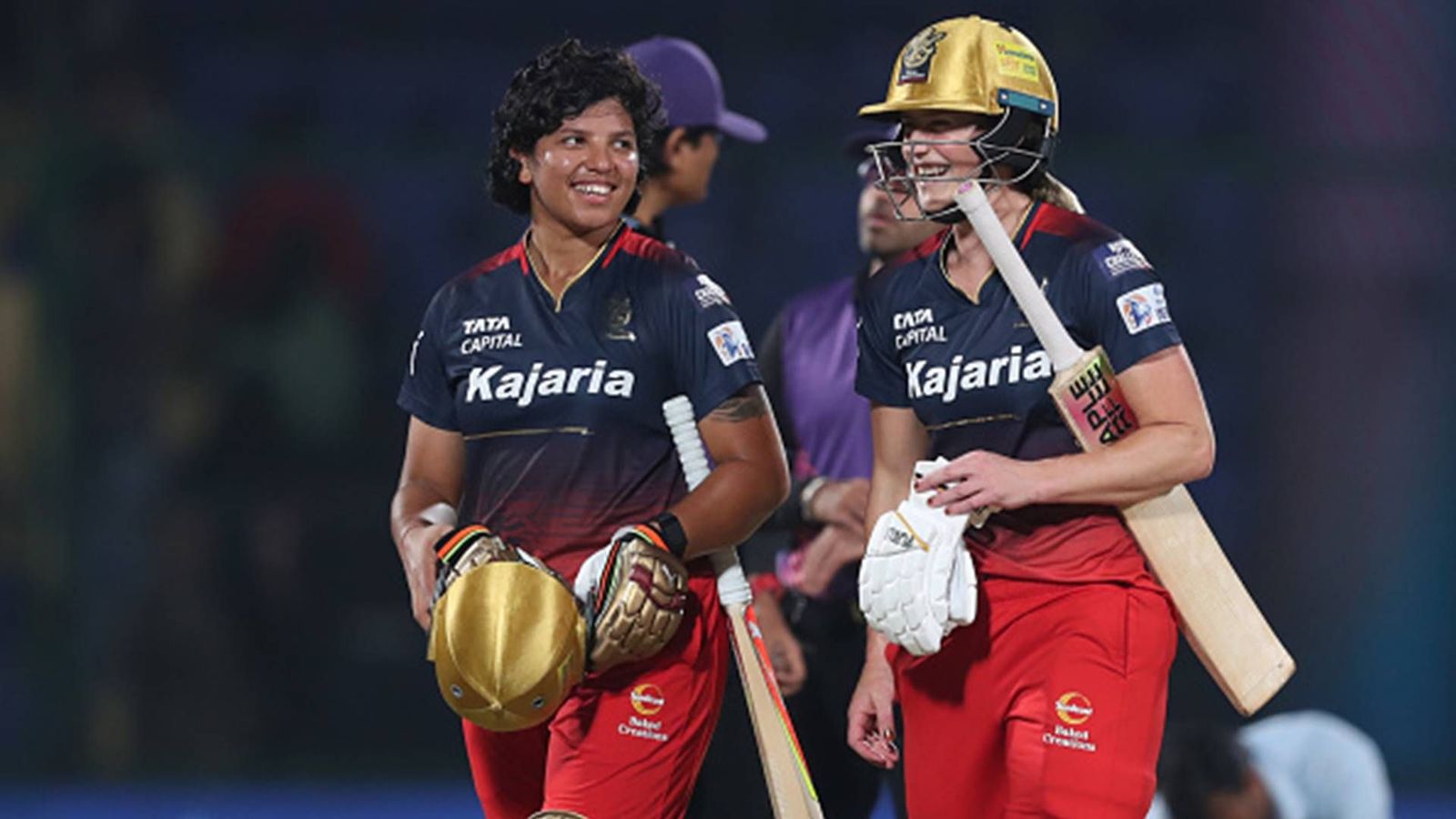 WPL 2024: Incredible Ellyse Perry's record-breaking 6/15 and patient 40 help RCB beat MI by 7 wickets, book eliminator berth Ellyse Perry and Richa Ghosh after winning the game against MI (Getty Images)