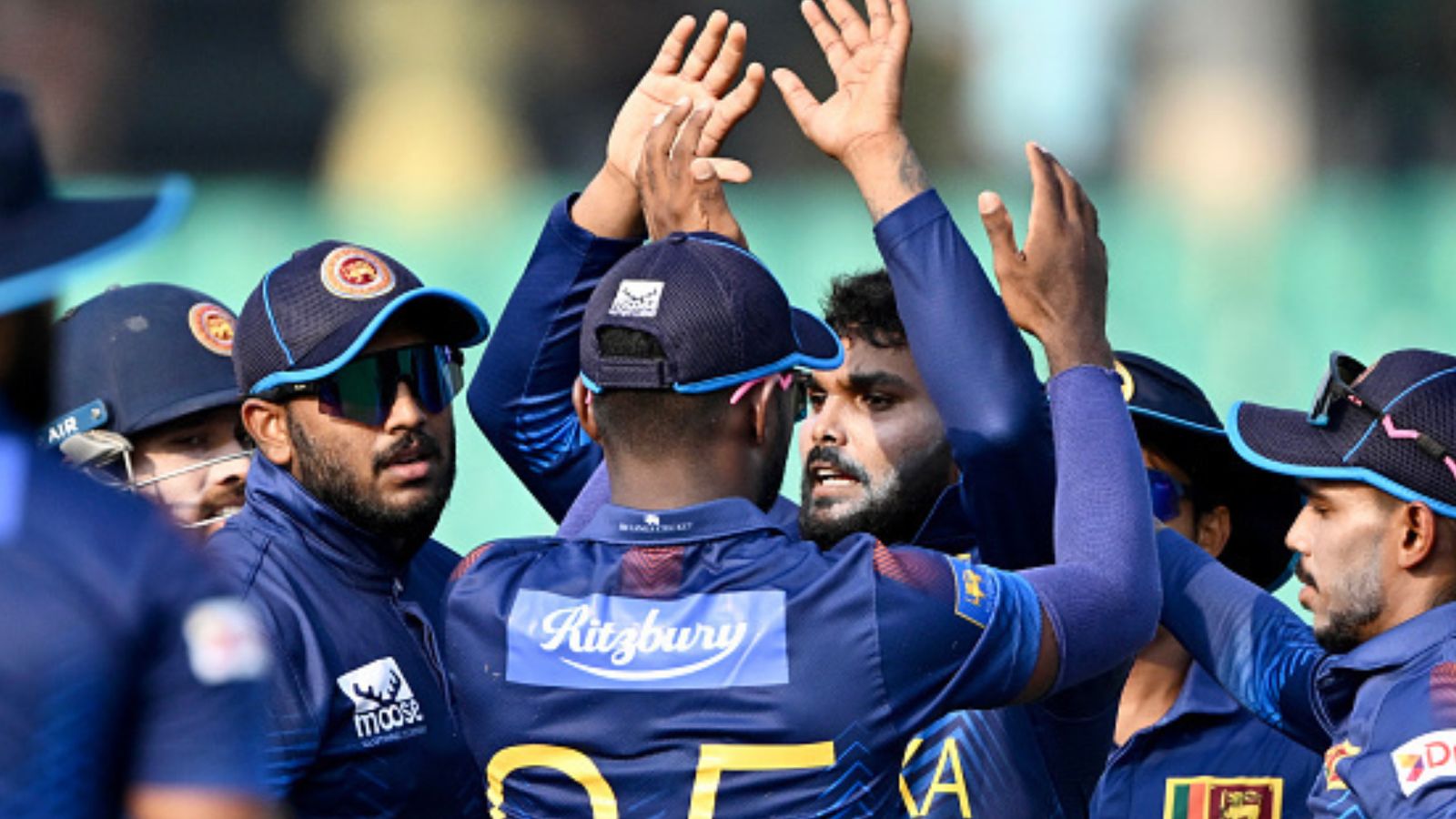 ICC bans Sunrisers Hyderabad and SL superstar ahead of IPL 2024 a day after revoking his retirement Sri Lanka's Wanindu Hasaranga (3R) celebrates with teammates after taking the wicket of Bangladesh's Soumya Sarkar during 2nd ODI on March 15. (Getty)