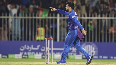 After 8 wickets in comeback series against Ireland, Rashid Khan enters top 10 T20I bowlers in ICC Rankings Afghanistan T20I captain in action against Ireland (Getty Images)