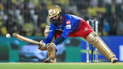 'The best part is I might not be there on the field...': Dinesh Karthik trolls himself after crucial 38-run knock in IPL 2024 opener Dinesh Karthik attempts an unorthodox shot in IPL 2024 opener (Getty Images)