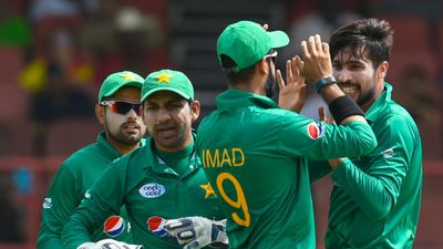 Big News: Pakistan superstar player comes out of retirement, makes himself available for T20 World Cup 2024 File Photo: Pakistan's star all-rounder Imad Wasim (centre) celebrates with his teammates Mohammad Amir (R), Sarfraz Ahmed (2L) and Babar Azam (L) during the 1st ODI against West Indies on April 7. (Getty)