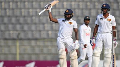 Record Alert: Ignored in IPL 2024 auction, Sri Lanka star scripts history with incredible ton, becomes 1st ever cricketer to bag this mighty milestone Sri Lanka's Kamindu Mendis (L) celebrates after scoring a century during the third day of the first Test against Bangladesh on March 24. (Getty)
