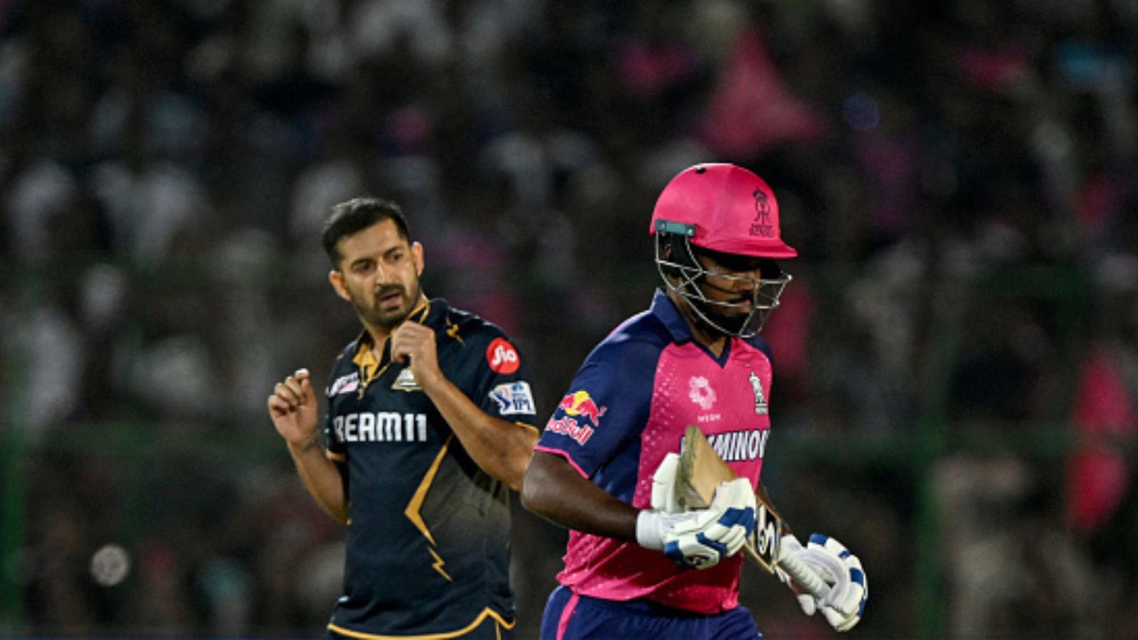 Big blow to Sanju Samson after RR's first defeat in IPL 2024, slapped with hefty fine for this reason RR skipper Sanju Samson (right) and GT's star pacer Mohit Sharma in this frame. (Getty)