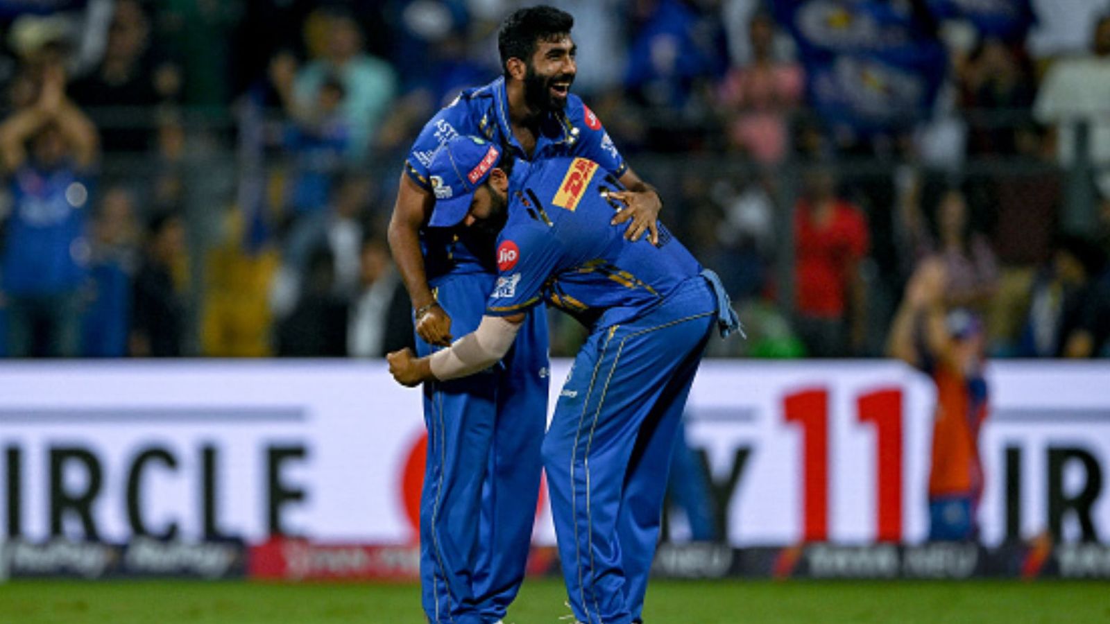 'Jasprit Bumrah either breaks my bat or breaks my foot': Suryakumar Yadav delivers sensational statement after MI's win over RCB Jasprit Bumrah and Rohit Sharma celebrating. (PC: Getty).