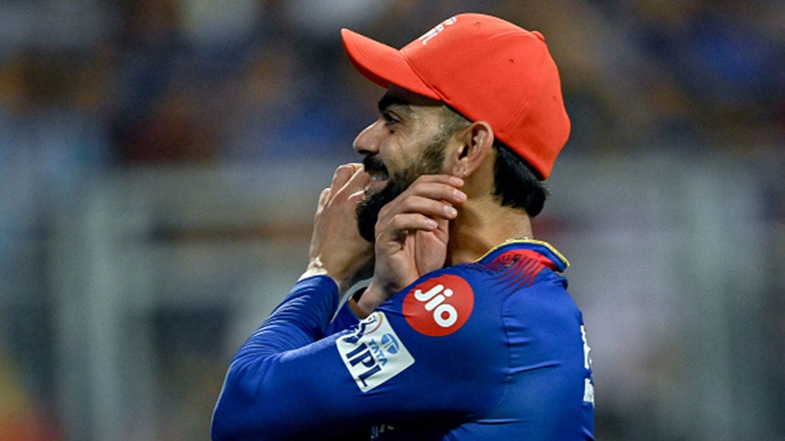 Watch: Wankhede crowd chants 'Kohli ko bowling do' as RCB bowlers struggle, here's how Virat reacted to their request Virat Kohli gestures to Wankhede crowd during the clash against Mumbai Indians (Getty Images)