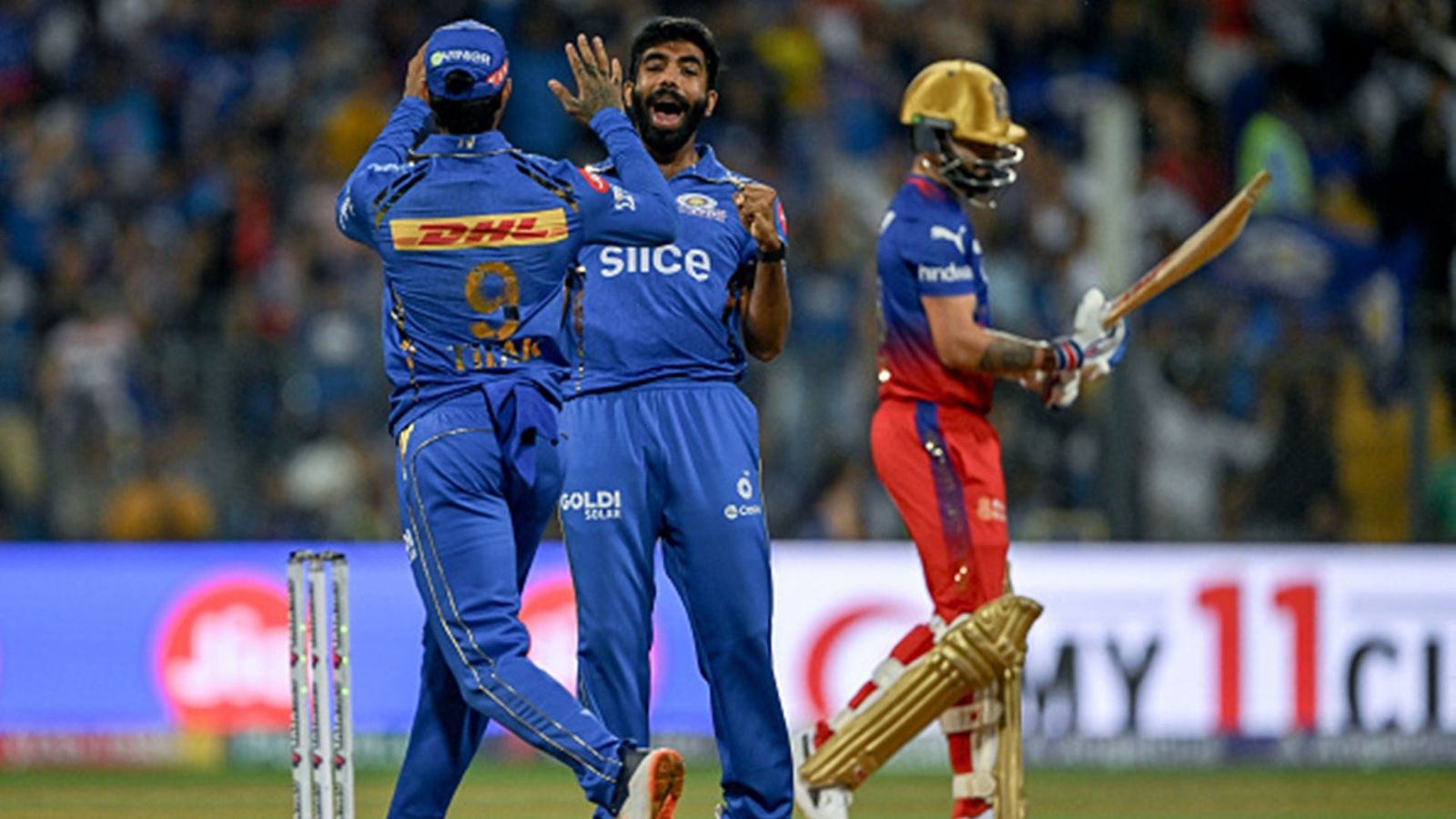 IPL 2024: Jasprit Bumrah jumps several places to lead purple cap race with second IPL fifer; check full list here Jasprit Bumrah celebrates Virat Kohli's wicket (Getty Images)