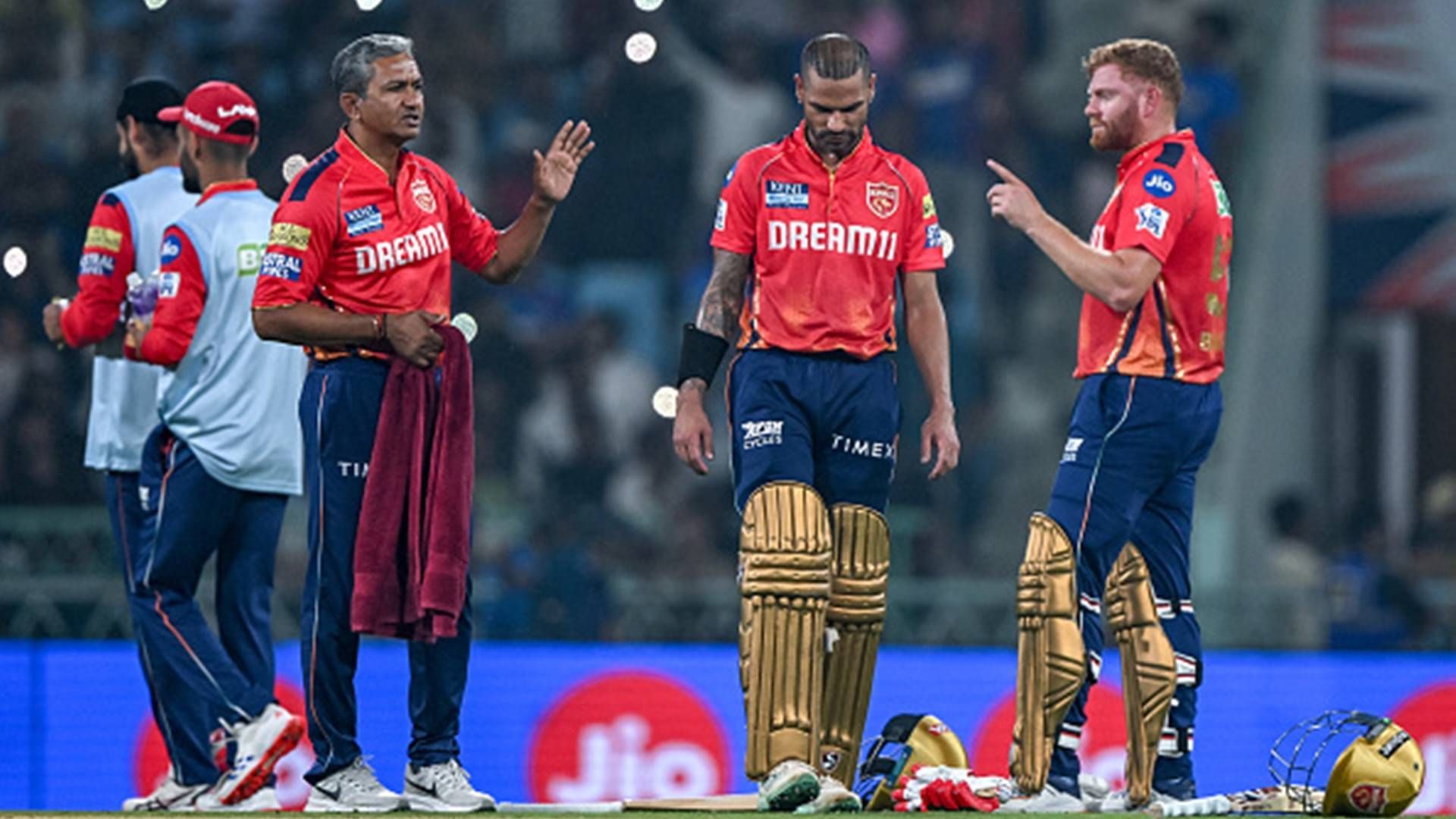 Sanjay Bangar reveals how many matches Punjab Kings captain Shikhar Dhawan will miss due to shoulder injury Sanjay Bangar with PBKS openers Shikhar Dhawan and Jonny Bairstow (Getty Images)