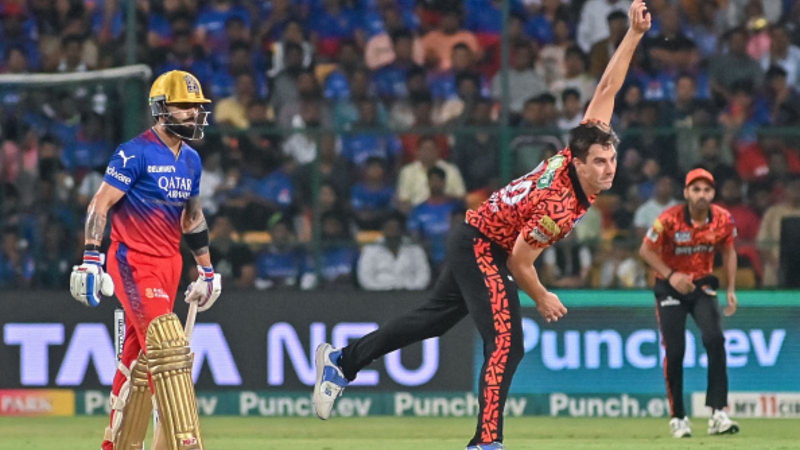 IPL 2024 Purple Cap: Pat Cummins roars into top 4 after superb show against RCB, Chahal reigns supreme; check the list here SRH captain Pat Cummins (right) and RCB's batting maestro Virat Kohli in this frame. (Getty)