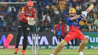 'Better than Gayle, just behind Rohit, Hardik...': India's WC-winner shuts down Virat Kohli's strike-rate critics in style Royal Challengers Bengaluru's Virat Kohli (R) plays a shot during the IPL 2024 clash against SRH on April 15. (Getty)