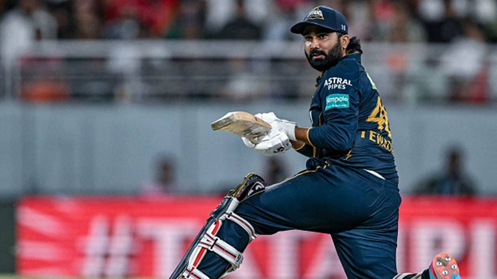 PBKS vs GT: After Sai Kishore's four-fer, finisher Rahul Tewatia's cameo helps Gujarat Titans beat Punjab Kings by 3 wickets Gujarat Titans' Rahul Tewatia plays a reverse sweep (Getty Images)