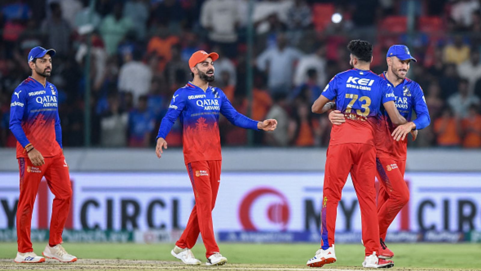 EXPLAINED: How can RCB still make it to IPL 2024's playoffs after much-needed victory over SRH? Here's the scenario Royal Challengers Bengaluru's Virat Kohli (2L) and his teammates celebrate their team's win against SRH at the end of their IPL 2024 clash at the Rajiv Gandhi International Stadium in Hyderabad on April 25. (Getty)
