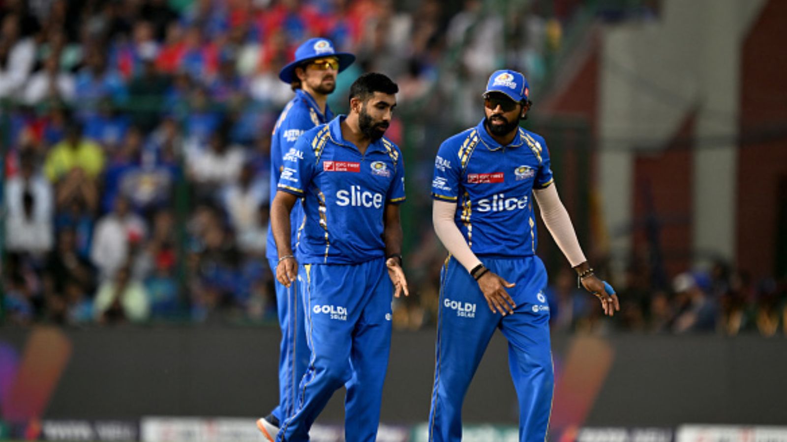 EXPLAINED: How Mumbai Indians can still qualify for IPL 2024's playoffs despite defeat against Delhi Capitals? Know all scenarios Mumbai Indians' Jasprit Bumrah (C) speaks captain Hardik Pandya (R) after dismissal of Delhi Capitals' captain Rishabh Pant (not pictured) during their IPL 2024 clash. (Getty)
