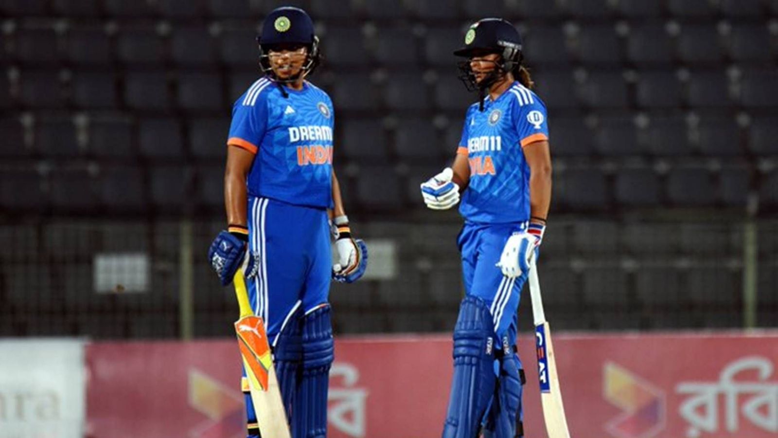 Harmanpreet Kaur's India continue winning run as Bangladesh succumb to Indian spinners and score 69 in run chase of 125, register 56-run win Richa Ghosh and Harmanpreet Kaur having a discussion during Bangladesh clash (Photo Courtesy: BCCI Women, X)