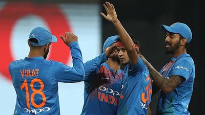 Indian pacer with 284 first-class wickets set to join Karun Nair in this County side, intends to 'help teammates win in any situation in the match' Siddarth Kaul celebrates a wicket with Virat Kohli and KL Rahul (File Photo: Getty Images)