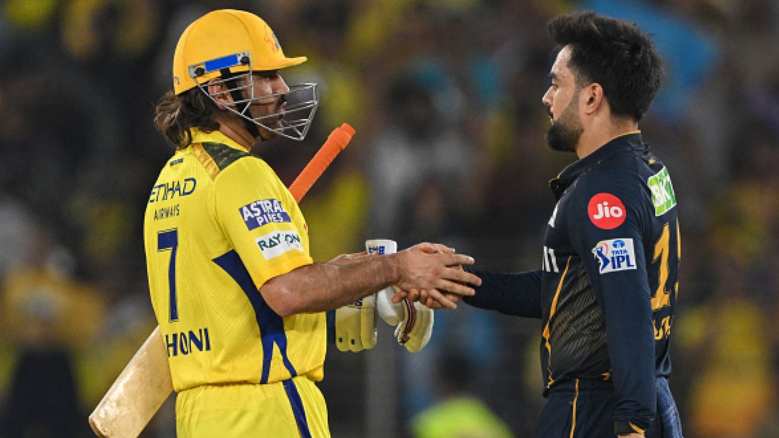 'Who cares if CSK win or lose...': Virender Sehwag takes a sly dig at MS Dhoni after Chennai's defeat against GT CSK's MS Dhoni (left) and GT's Rashid Khan in this frame. (Getty)