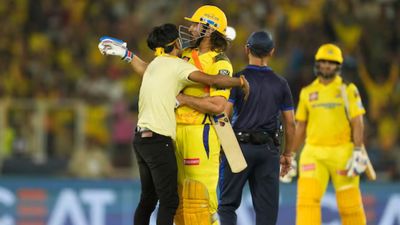 Police arrest MS Dhoni fan on criminal trespassing charge for breaching security to meet CSK superstar during IPL 2024 clash against GT A fan was seen invading the pitch to meet MS Dhoni during IPL 2024 clash between CSK and GT. (Screengrab-X)