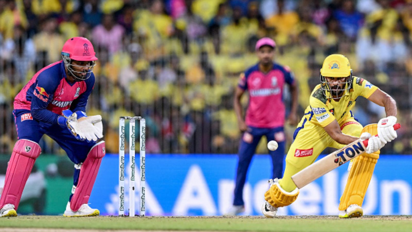 IPL 2024: Ruturaj Gaikwad's sedate knock after Simarjeet's 3-fer hand RR hat-trick of defeats as CSK inch closer to playoffs with easy win CSK’s captain Ruturaj Gaikwad (R) plays a shot as his RR’s counterpart and wicketkeeper Sanju Samson watches during the IPL 2024 match between CSK and RR. (Getty)