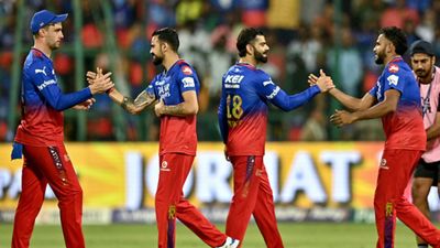 EXPLAINED: How RCB can go past CSK and storm into IPL 2024's playoffs following stunning win over DC, here's the scenario Royal Challengers Bengaluru's Virat Kohli (C) celebrates his team's win against Delhi Capitals at the end of their IPL 2024 clash on May 12. (Getty)