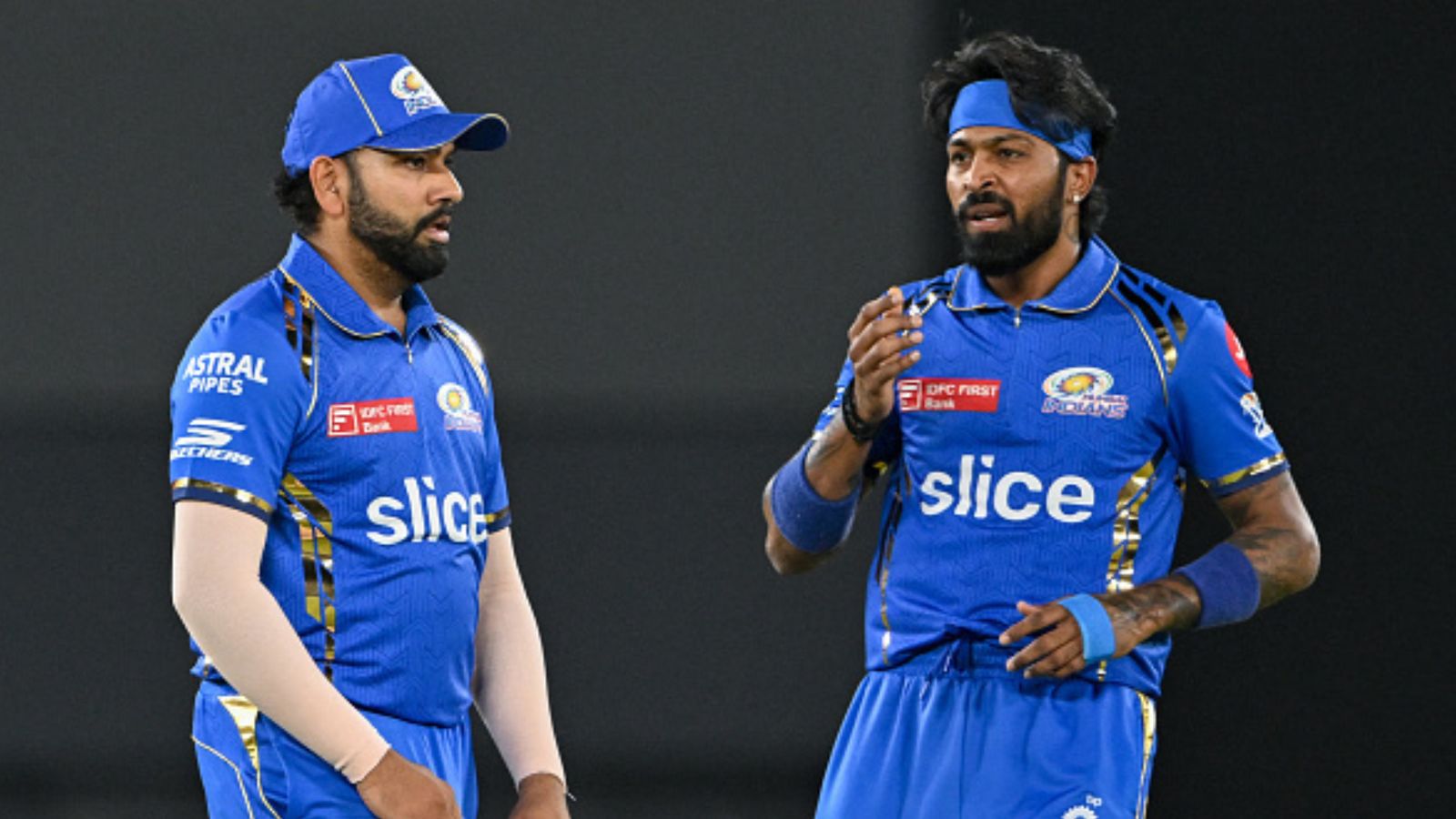 Report reveals clear rift in Mumbai Indians camp as Indian players back Rohit Sharma, foreign contingent supports Hardik Pandya MI skipper Hardik Pandya (right) and superstar batter Rohit Sharma in this frame. (Getty)