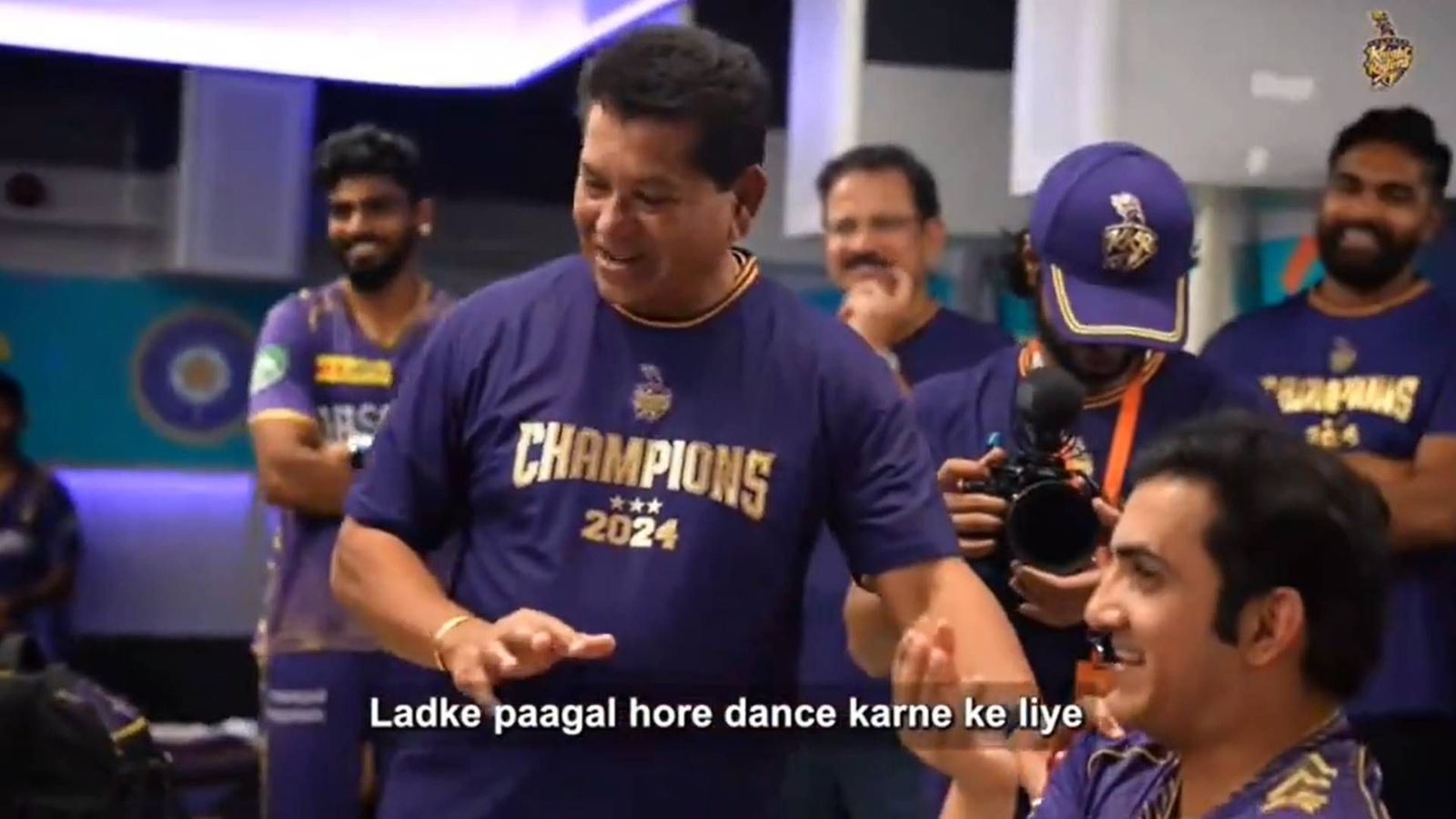 'Ladke pagal hore hai dance karne ke liye': Gautam Gambhir interrupts coach Chandrakant Pandit's speech midway to leave everyone in splits KKR coach Chandrakant Pandit and mentor Gautam Gambhir in the dressing room (Screengrab: X)