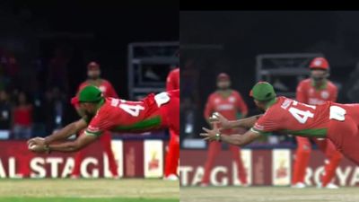 WATCH: Oman captain Aqib Ilyas turns 'Superman' to take catch of the tournament, dismisses Glenn Maxwell on golden duck Aqib Ilyas takes Glenn Maxwell's catch (Twitter screen grab)