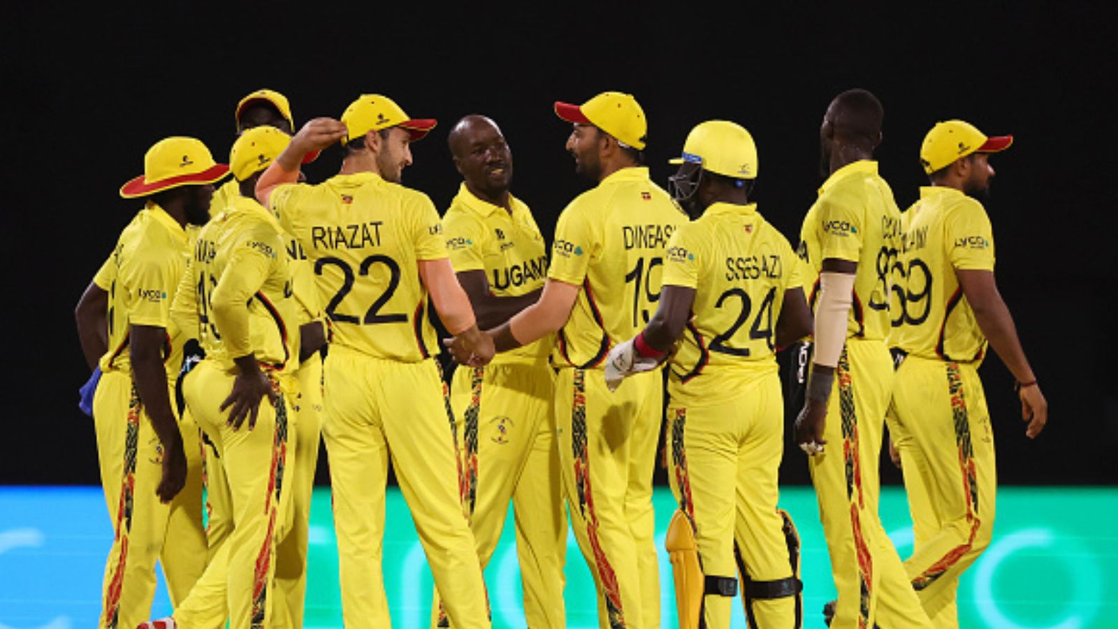 43-yr-old Uganda spinner busts Anrich Nortje's three-day old record, bowls most economic spell in the history of T20 World Cup Uganda's Frank Nsubuga celebrates with teammates after a successful DRS review to dismiss Hiri Hiri of Papua New Guinea during their T20 World Cup match on June 6. (Getty)
