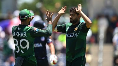 ‘Haris Rauf is unprofessional, never learns anything’: Ex-Pakistan captain tears apart ace pacer after Men in Green's shocking defeat vs USA Pakistan's Haris Rauf celebrates with teammate Fakhar Zaman after taking the wicket of Andries Gous of USA during their T20 World Cup clash on June 6. (Getty)