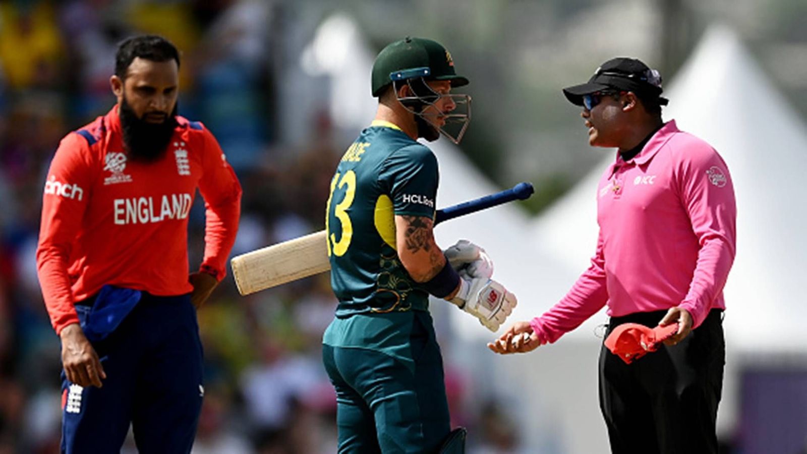 Adam Zampa, Travis Head back Matthew Wade against umpire Nitin Menon for robbing him off a dead ball Matthew Wade in an argument with umpire Nitin Menon during Adil Rashid's over (Getty Images)