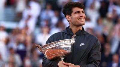 Carlos Alcaraz downs Alexander Zverev to clinch 1st ever French Open title, becomes youngest to bag this mega milestone Spain's Carlos Alcaraz celebrates with the French Open 2024 title after winning against Germany's Alexander Zverev at the end of their men's singles final match on June 9. (Getty)