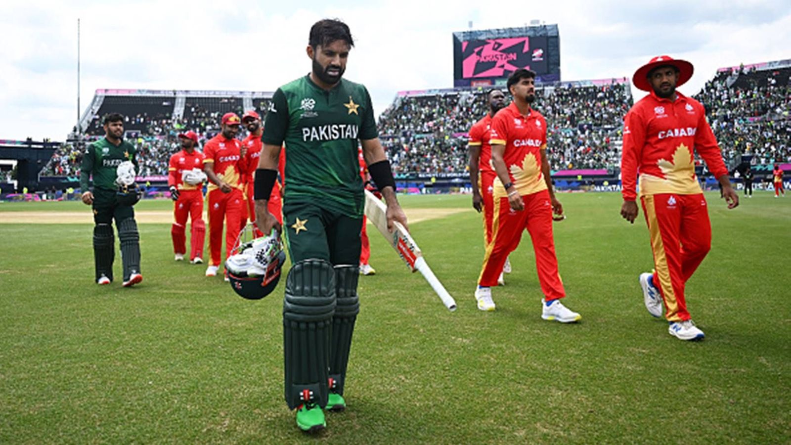 Mohammad Rizwan breaks record for slowest fifty in T20 World Cup history, equals Rohit Sharma and Babar Azam's feat too Mohammad Rizwan walking back to the dressing room after Pakistan beat Canada (Getty Images)