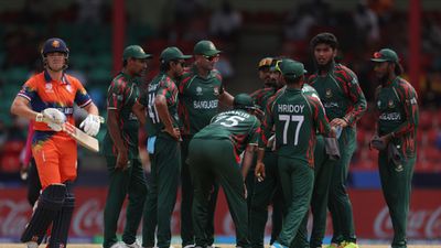T20 World Cup: Shakib's batting gem coupled with Rishad's spin wizardry help Bangladesh knock out Sri Lanka with emphatic win over Netherlands Bangladesh's Rishad Hossain celebrates with team mates after taking the wicket of Bas de Leede of The Netherlands during their T20 World Cup clash on June 13. (Getty)