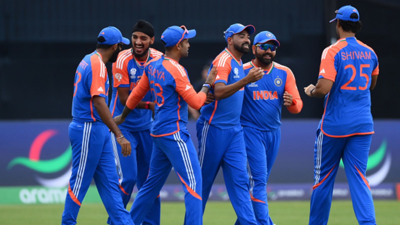 'When he bats, dressing room is...': Harbhajan Singh reveals India’s biggest match-winner in T20 World Cup Team India players celebrate with each other during their T20 World Cup match. (Getty)