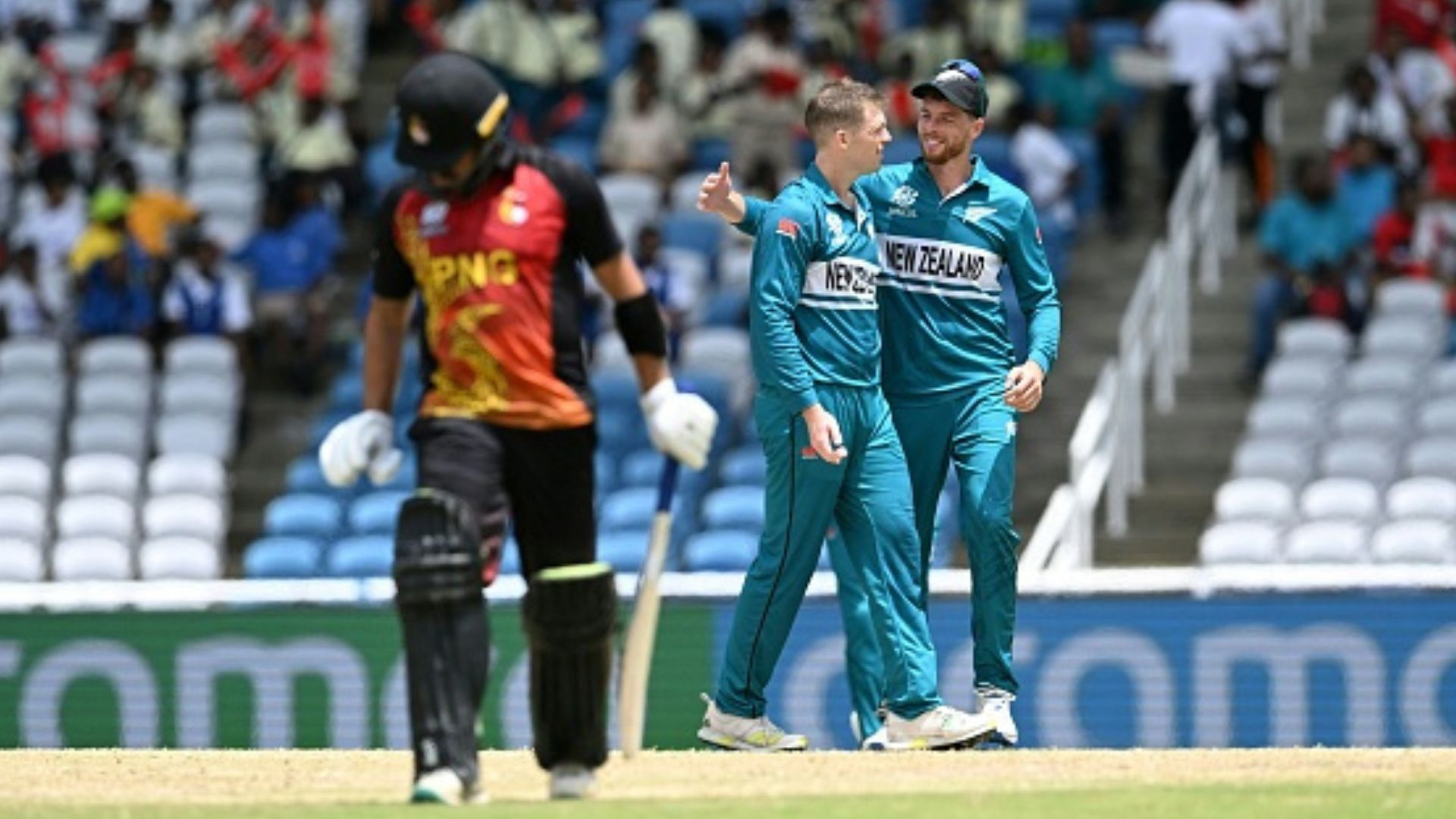 NZ vs PNG: Lockie Ferguson's record spell helps New Zealand sign off T20 World Cup with consolation win over Papua New Guinea New Zealand's players congratulate Lockie Ferguson after dismissing Papua New Guinea's Chad Soper during their T20 World Cup 2024 match on June 17. (Getty)