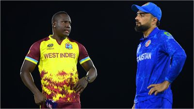 'This loss does not affect us': Rashid Khan confident despite loss 104-run defeat against West Indies Rovman Powell and Rashid Khan in frame (Getty)