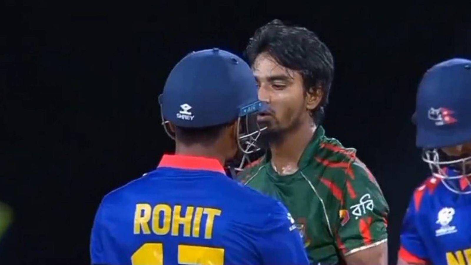 Big blow to Bangladesh ahead of Super 8 clash vs Australia, in-form pacer punished by ICC for ugly spat with Nepal captain Tanzim Hasab Sakib involved in a heated exchange with Nepal captain Rohit Paudel (Screengrab: X)