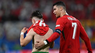 Euro 2024: Portugal substitute's stoppage time goal leads Cristiano Ronaldo's side to 2-1 win in thrilling encounter Francisco Conceicao (L) of Portugal celebrates with Christiano Ronaldo (7) after scoring a goal against Czech Republic (Getty Images)