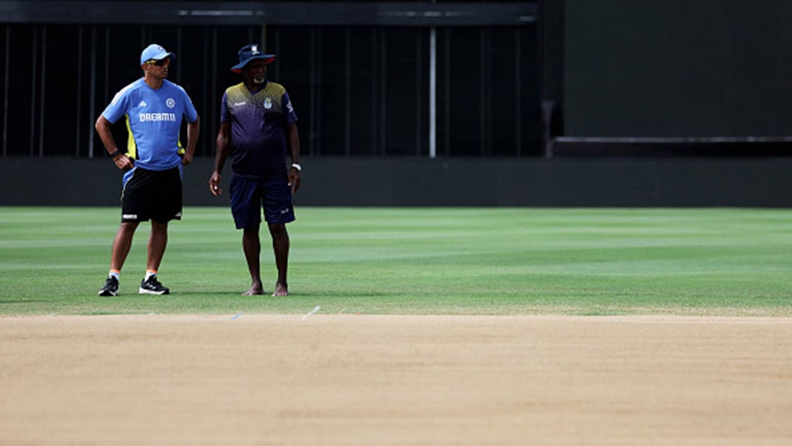 CPL franchise Barbados Royals' coaching staff has an advice for India and Afghanistan spinners ahead of Super 8 clash Head coach Rahul Dravid with the pitch curator in Barbados (Getty Images)
